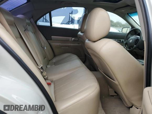 2005 Lincoln LS Sport z VIN 1LNHM87A95Y653578, wystawiony jako Copart lot #76339924 z przebiegiem 97 998 mil mil oraz Szkoda całkowita • Salvage title. Historia ofert i sprzedaży dostępna na DreamBid. Obrazek 10.