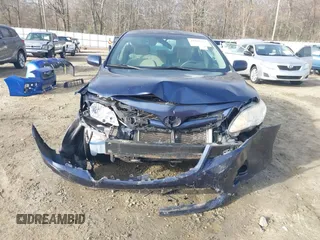 2013 Toyota Corolla L with VIN 2T1BU4EE6DC092106, listed as a IAAI auction lot 41801572 with 182,248 mi miles and . Bid and sale history available at DreamBid. Image 6.