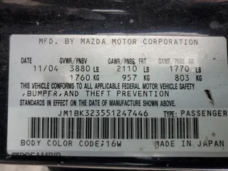 2005 Mazda 3 s with VIN JM1BK323551247446, listed as a Copart auction lot 48338215 with 163,744 mi miles and Salvage Title. Bid and sale history available at carsss.com. Image 12.