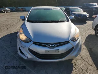 2013 Hyundai Elantra Coupe GS PZEV with VIN KMHDH6AE0DU022405, listed as a Copart auction lot 76497474 with 64,249 mi miles and Salvage Title. Bid and sale history available at carsss.com. Image 5.