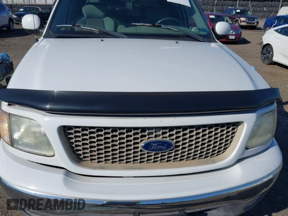2003 Ford F-150 XLT with VIN 1FTRW08633KD11896, listed as a IAAI auction lot 42137360 with 118,654 mi miles. Bid and sale history available at carsss.com. Image 16.