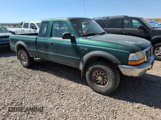 1999 Ford Ranger XL with VIN 1FTZR15V6XPB66872, listed as a Copart auction lot 63710445 with 178,447 mi miles and Clean title. Bid and sale history available at DreamBid. Image 4.