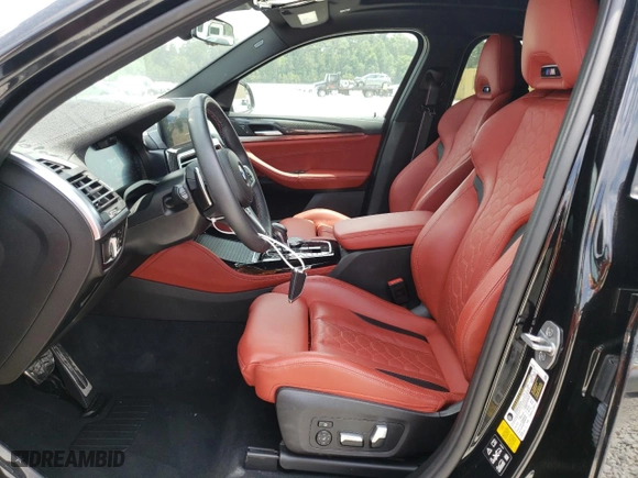 2022 BMW X4 M with VIN 5YM23EC02N9M62773, listed as a Copart auction lot 53100254 with 9566 miles and Salvage Title. Bid and sale history available at carsss.com. Image 7.