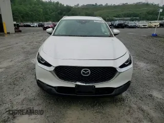 2023 Mazda CX-30 S Select z VIN 3MVDMBBM2PM521471, wystawiony jako Copart lot #63272965 z przebiegiem 26 879 mil mil oraz Szkoda całkowita • Salvage title. Historia ofert i sprzedaży dostępna na DreamBid. Obrazek 14.