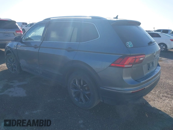 2022 Volkswagen Tiguan SE with VIN 3VV3B7AX1NM147445, listed as a IAAI auction lot 41755217 with 59,399 mi miles and . Bid and sale history available at DreamBid. Image 3.