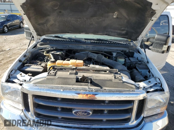 2001 Ford F-250 with VIN 3FTNF21L81MA77058, listed as a Copart auction lot 85871654 with 163,557 mi miles and Salvage title. Bid and sale history available at DreamBid. Image 11.
