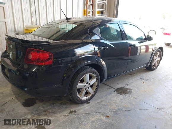 2014 Dodge Avenger SE with VIN 1C3CDZAB0EN202602, listed as a IAAI auction lot 42133657 with 130,741 mi miles. Bid and sale history available at carsss.com. Image 4.