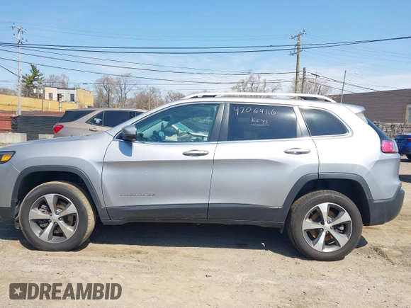2020 Jeep Cherokee Limited z VIN 1C4PJMDX0LD627840, wystawiony jako IAAI lot #42064116 z przebiegiem 65 092 mil mil oraz . Historia ofert i sprzedaży dostępna na DreamBid. Obrazek 14.