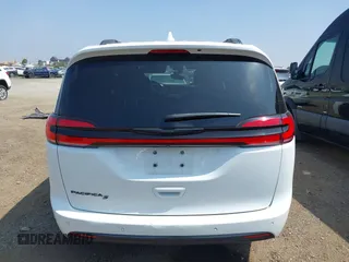 2021 Chrysler Pacifica Touring with VIN 2C4RC1FG7MR605587, listed as a IAAI auction lot 42329028 with 111,305 mi miles and . Bid and sale history available at DreamBid. Image 16.