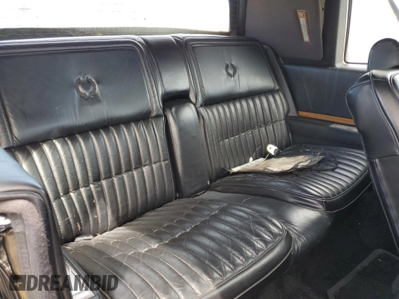 1985 Cadillac Eldorado z VIN 1G6EL578XFE614641, wystawiony jako Copart lot #75663984 z przebiegiem 54 128 mil mil oraz Szkody całkowita. Historia ofert i sprzedaży dostępna na DreamBid. Obrazek 10.