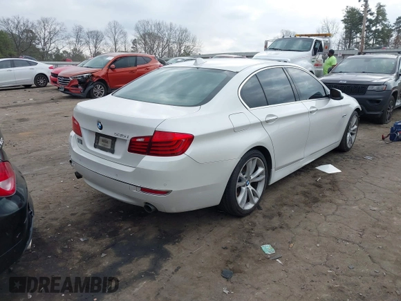 2016 BMW 5 Series 535i with VIN WBA5B1C55GG134983, listed as a IAAI auction lot 41519709 with 192,363 mi miles and . Bid and sale history available at DreamBid. Image 4.