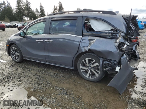2021 Honda Odyssey Touring with VIN 5FNRL6H87MB033970, listed as a Copart auction lot 48928895 with 52,287 mi miles and Salvage Title. Bid and sale history available at carsss.com. Image 2.