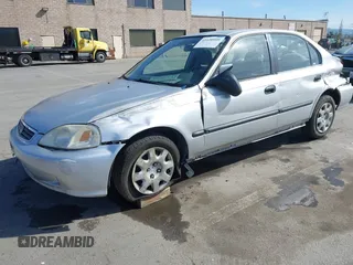 1999 Honda Civic LX with VIN JHMEJ6670XS000958, listed as a IAAI auction lot 41620949 with 93,698 mi miles and . Bid and sale history available at DreamBid. Image 17.