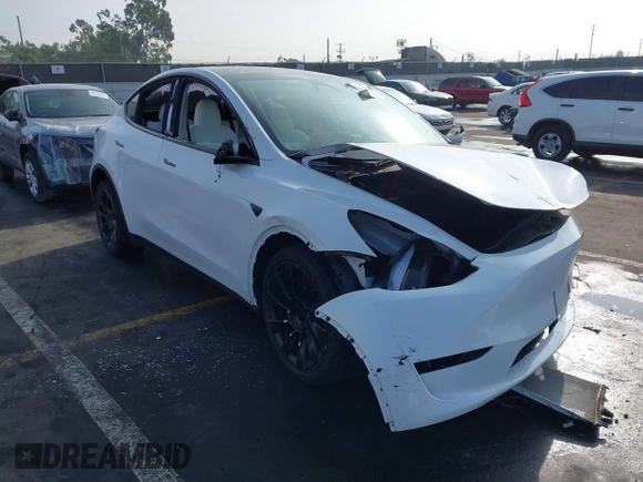 2023 Tesla Model Y Long Range with VIN 7SAYGDEE3PF900030, listed as a IAAI auction lot 41147192 with 13,903 mi miles and . Bid and sale history available at DreamBid. Image 1.