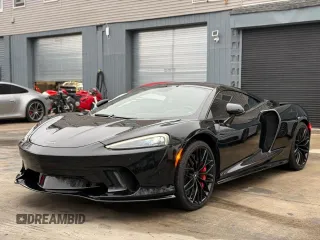 2023 McLaren GT z VIN SBM22GCA3PW002548, wystawiony jako Copart lot #52157855 z przebiegiem 779 mil mil oraz Szkody całkowita. Historia ofert i sprzedaży dostępna na DreamBid. Obrazek 12.