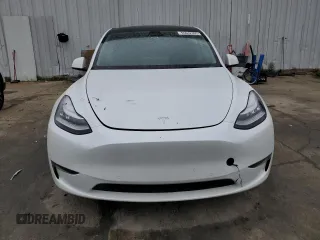 2022 Tesla Model Y Long Range z VIN 7SAYGDEE5NA016276, wystawiony jako Copart lot #55942355 z przebiegiem 14 085 mil mil oraz Szkody całkowita. Historia ofert i sprzedaży dostępna na DreamBid. Obrazek 5.