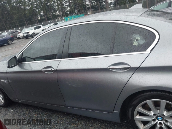 2012 BMW 5 Series 528i xDrive with VIN WBAXH5C52CDW05286, listed as a IAAI auction lot 41216636 with 99,543 mi miles and . Bid and sale history available at DreamBid. Image 14.