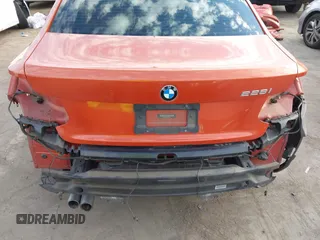 2015 BMW 2 Series 228i with VIN WBA1F9C56FVW98461, listed as a IAAI auction lot 41663193 with 94,584 mi miles. Bid and sale history available at carsss.com. Image 6.