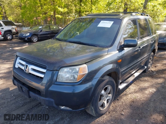 2006 Honda Pilot EX-L with VIN 2HKYF18586H556169, listed as a IAAI auction lot 42031231 with 260,963 mi miles and . Bid and sale history available at DreamBid. Image 2.