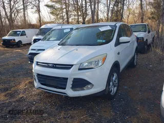 2013 Ford Escape SE with VIN 1FMCU9GX0DUD93680, listed as a IAAI auction lot 41792386 with 262,671 mi miles and . Bid and sale history available at DreamBid. Image 2.