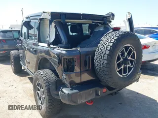 2024 Jeep Wrangler Rubicon with VIN 1C4PJXFG5RW259926, listed as a IAAI auction lot 42009249 with 37,988 mi miles and . Bid and sale history available at DreamBid. Image 3.