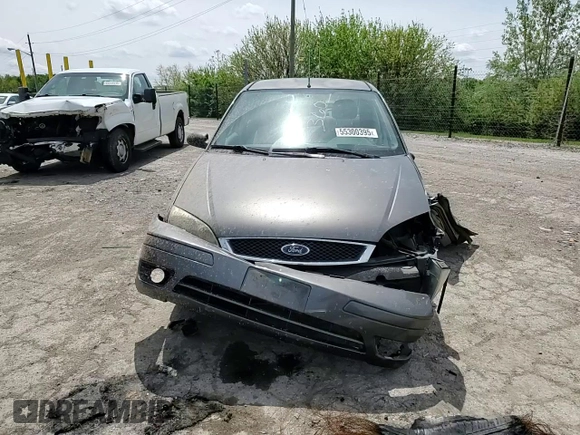 2007 Ford Focus S z VIN 1FAHP34N17W103625, wystawiony jako Copart lot #55300395 z przebiegiem 82 041 mil mil oraz Szkoda całkowita • Salvage title. Historia ofert i sprzedaży dostępna na DreamBid. Obrazek 13.