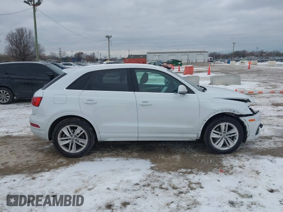 2017 Audi Q3 Premium Plus z VIN WA1JCCFS6HR008921, wystawiony jako IAAI lot #41351675 z przebiegiem 117 158 mil mil oraz . Historia ofert i sprzedaży dostępna na DreamBid. Obrazek 13.