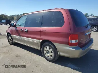 2003 Kia Sedona LX with VIN KNDUP131636364111, listed as a Copart auction lot 77393214 with 0 mi miles and Salvage Title. Bid and sale history available at carsss.com. Image 2.