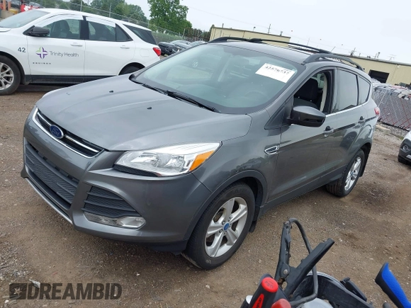 2014 Ford Escape SE with VIN 1FMCU9GX4EUA83808, listed as a IAAI auction lot 42576737 with 116,074 mi miles and . Bid and sale history available at DreamBid. Image 2.