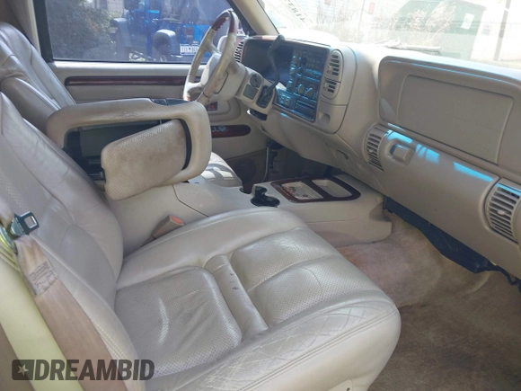 1999 Cadillac Escalade z VIN 1GYEK13R9XR400123, wystawiony jako IAAI lot #41837946 z przebiegiem 207 213 mil mil oraz . Historia ofert i sprzedaży dostępna na DreamBid. Obrazek 5.