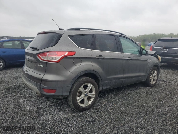 2014 Ford Escape SE with VIN 1FMCU0GX7EUA88805, listed as a Copart auction lot 51124585 with 105,518 mi miles and Salvage Title. Bid and sale history available at carsss.com. Image 3.