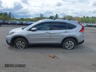 2012 Honda CR-V EX-L with VIN 2HKRM4H7XCH623122, listed as a IAAI auction lot 42204835 with 231,735 mi miles and . Bid and sale history available at carsss.com. Image 14.