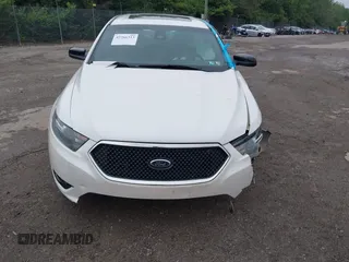 2014 Ford Taurus SHO with VIN 1FAHP2KT9EG107862, listed as a IAAI auction lot 42266313 with Not provided miles and . Bid and sale history available at DreamBid. Image 13.