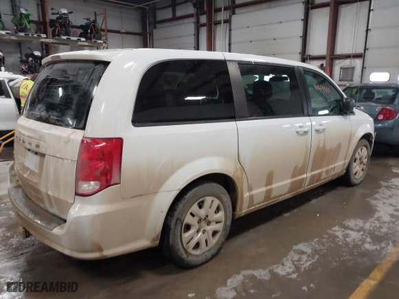 2018 Dodge Grand Caravan SE with VIN 2C4RDGBG0JR180361, listed as a IAAI auction lot 41064126 with 135,841 mi miles. Bid and sale history available at carsss.com. Image 4.