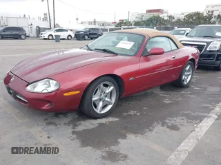 1997 Jaguar XK with VIN SAJGX2745VC017589, listed as a IAAI auction lot 42208129 with Not Provided miles and . Bid and sale history available at DreamBid. Image 2.