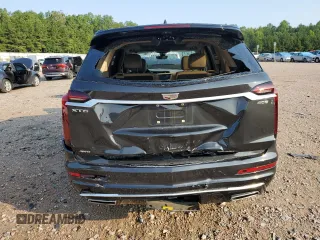 2020 Cadillac XT6 AWD Premium Luxury with VIN 1GYKPFRSXLZ208635, listed as a Copart auction lot 69057844 with 30,946 mi miles and Salvage Title. Bid and sale history available at carsss.com. Image 6.