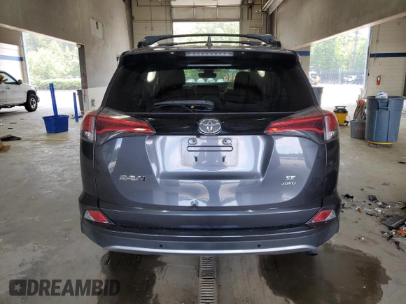 2018 Toyota RAV4 SE with VIN JTMJFREV1JD244469, listed as a Copart auction lot 62608485 with Not provided miles and Salvage title. Bid and sale history available at DreamBid. Image 6.