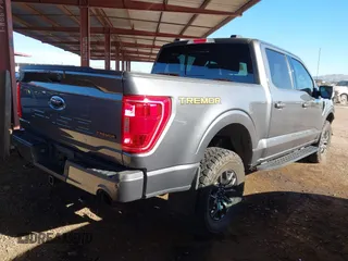 2023 Ford F-150 XL with VIN 1FTEW1E88PFB25702, listed as a IAAI auction lot 41232969 with 20,400 mi miles. Bid and sale history available at carsss.com. Image 4.
