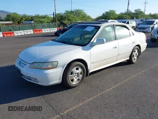 2002 Honda Accord EX z VIN 1HGCG16522A024557, wystawiony jako IAAI lot #41525344 z przebiegiem 219 786 mil mil oraz . Historia ofert i sprzedaży dostępna na DreamBid. Obrazek 2.