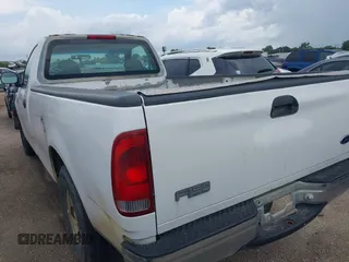 1998 Ford F-150 with VIN 1FTRF1764WKB01383, listed as a IAAI auction lot 42310759 with 51,902 mi miles and . Bid and sale history available at DreamBid. Image 3.