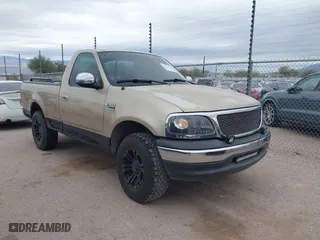 1999 Ford F-150 Work Series with VIN 1FTRF17WXXKA74403, listed as a IAAI auction lot 41525113 with 1 mi miles. Bid and sale history available at carsss.com. Image 1.