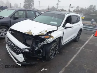 2019 Hyundai Santa Fe Ultimate with VIN 5NMS5CAA3KH036089, listed as a IAAI auction lot 40810710 with 62,561 mi miles and . Bid and sale history available at DreamBid. Image 18.