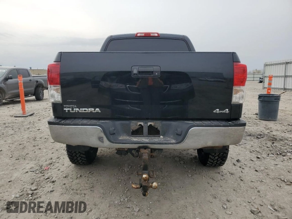 2012 Toyota Tundra 4WD Truck with VIN 5TFDW5F1XCX214437, listed as a Copart auction lot 53457125 with 163,049 mi miles and Clean Title. Bid and sale history available at carsss.com. Image 6.