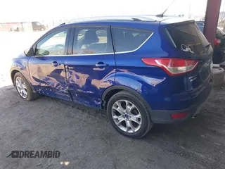 2016 Ford Escape Titanium with VIN 1FMCU9JXXGUB58961, listed as a IAAI auction lot 41772977 with 122,665 mi miles. Bid and sale history available at carsss.com. Image 3.