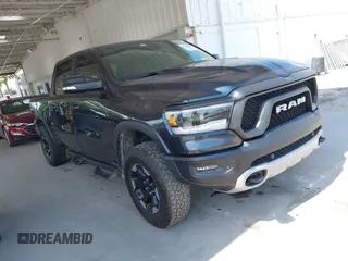 2019 Ram 1500 Rebel with VIN 1C6SRFLT1KN560260, listed as a IAAI auction lot 42346505 with 134,862 mi miles and . Bid and sale history available at DreamBid. Image 1.