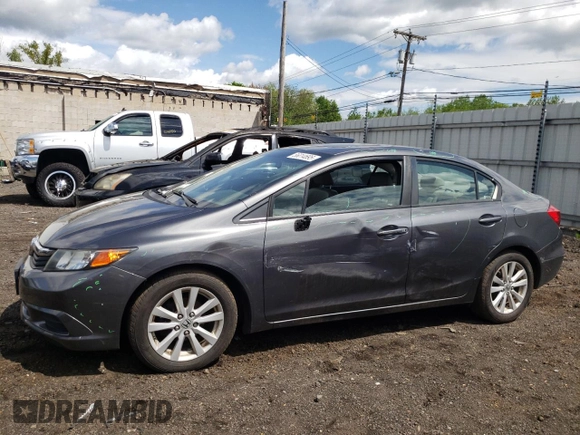 2012 Honda Civic EX-L with VIN 2HGFB2F98CH565717, listed as a Copart auction lot 56014695 with 159,440 mi miles and Salvage Title. Bid and sale history available at DreamBid. Image 1.