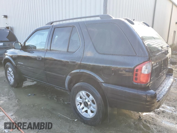 2003 Isuzu Rodeo with VIN 4S2CK58W334306303, listed as a Copart auction lot 83820444 with 180,040 mi miles and Salvage Title. Bid and sale history available at DreamBid. Image 2.
