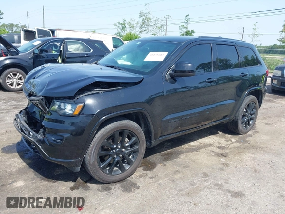 2018 Jeep Grand Cherokee Altitude with VIN 1C4RJEAG7JC354191, listed as a IAAI auction lot 42276081 with 51,220 mi miles and . Bid and sale history available at DreamBid. Image 17.