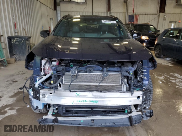 2021 Toyota RAV4 Hybrid XSE with VIN 2T3E6RFV7MW009954, listed as a Copart auction lot 54954425 with 61,397 mi miles and Salvage title. Bid and sale history available at DreamBid. Image 5.