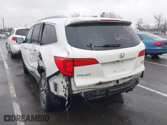 2016 Honda Pilot Touring with VIN 5FNYF6H95GB062089, listed as a IAAI auction lot 41810378 with 74,704 mi miles and . Bid and sale history available at DreamBid. Image 3.